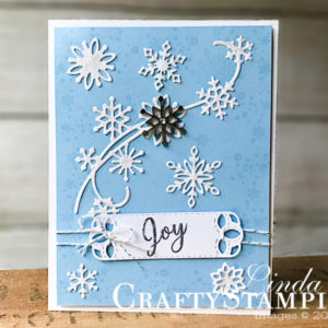 Snowflake Showcase - Swirling Joy | Stampin Up Demonstrator Linda Cullen | Crafty Stampin’ | Purchase your Stampin’ Up Supplies | Snow Is Glistening stamp set | Snowfall Thinlits Dies | Stitched Label Framelits | Silver Baker’s Twine | Snowflake Trinkets | Wink of Stella