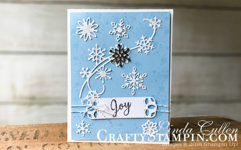 Snowflake Showcase - Swirling Joy | Stampin Up Demonstrator Linda Cullen | Crafty Stampin’ | Purchase your Stampin’ Up Supplies | Snow Is Glistening stamp set | Snowfall Thinlits Dies | Stitched Label Framelits | Silver Baker’s Twine | Snowflake Trinkets | Wink of Stella