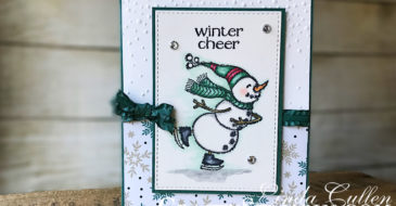 Spirited Snowmen Winter Cheer | Stampin Up Demonstrator Linda Cullen | Crafty Stampin’ | Purchase your Stampin’ Up Supplies | Spirited Snowmen Stamp Set | Joyous Noel Specialty Designer Series Paper | Rectangle Stitched Framelits | Softly Falling Embossing Folder | Tranquil Tide 3/8 Mini Ruffled Ribbon | Rhinestone Basic Jewels