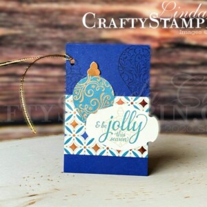 Coffee & Crafts: Christmas Gleaming Fast, Fun, and Fabulous Gift Tags | Stampin Up Demonstrator Linda Cullen | Crafty Stampin’ | Purchase your Stampin’ Up Supplies | Christmas Gleaming Cling Stamp Set (English) [150464] | Brightly Gleaming Specialty Designer Series Paper [150429] | Copper Foil Sheets [142020] - Price: $5.00 - http://msb.im/zxq | Gleaming Ornaments Punch Pack [150647] | Detailed Trio Punch [146320] | Story Label Punch [150076] | Wonder Of The Season Ribbon Combo Pack [153537] |